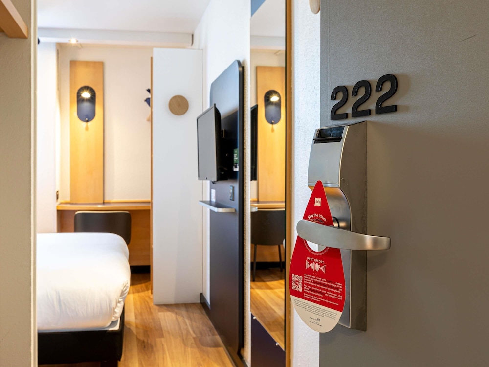 Habitación estándar 2 Camas individuales del hotel Ibis Saint-denis Stade Ouest. Foto 4