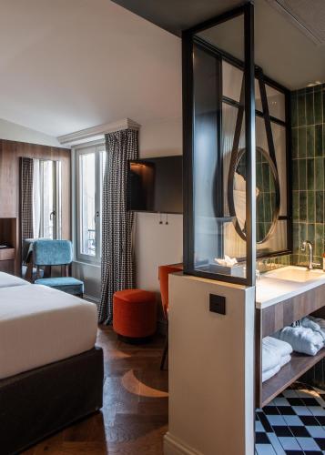 Habitación Clásica del hotel Flanelles Paris. Foto 16