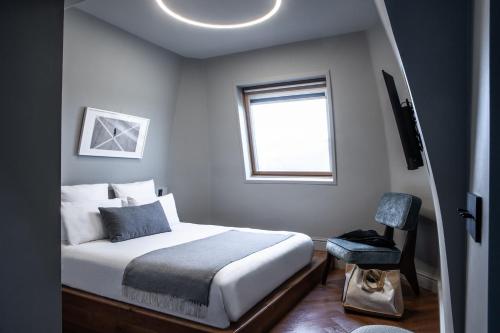 Habitación doble Superior Vista ciudad 1 Cama doble del hotel Flanelles Paris. Foto 7