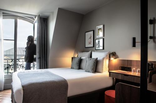 Habitación doble Superior Vista ciudad 1 Cama doble del hotel Flanelles Paris. Foto 8