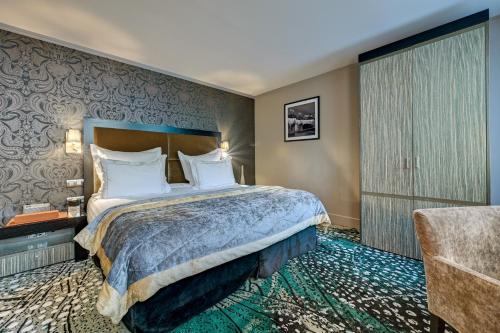 Habitación Doble Deluxe del hotel Juliana Paris. Foto 3