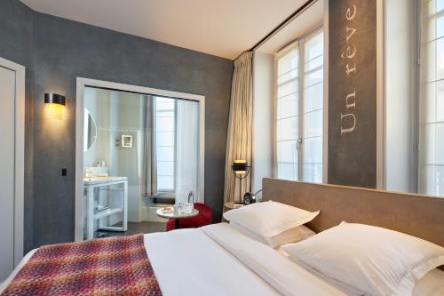 Habitación Familiar del hotel Le Pavillon Des Lettres. Foto 4