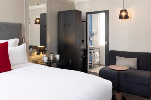 Habitación Executive con balcón y acceso al spa del hotel Les Matins De Paris and Spa. Foto 2