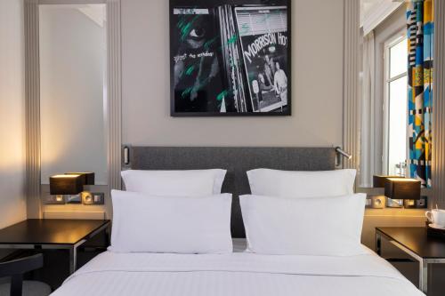 Habitación Superior con terraza y acceso al spa del hotel Les Matins De Paris and Spa. Foto 1
