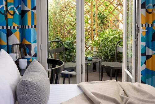Habitación Superior con terraza y acceso al spa del hotel Les Matins De Paris and Spa. Foto 6