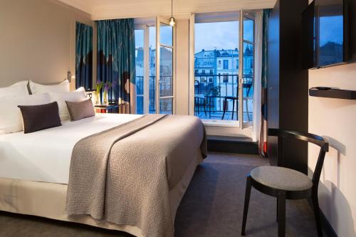 Habitación Deluxe con terraza y acceso al spa del hotel Les Matins De Paris and Spa