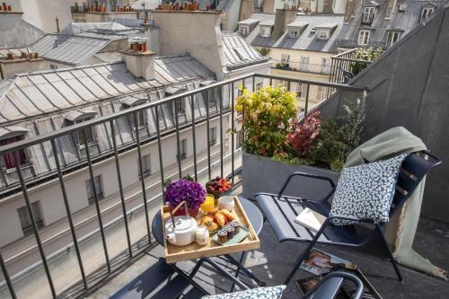 Habitación Deluxe con terraza y acceso al spa del hotel Les Matins De Paris and Spa. Foto 1