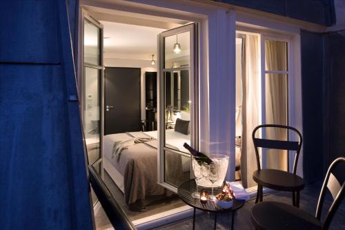 Habitación Deluxe con terraza y acceso al spa del hotel Les Matins De Paris and Spa. Foto 8