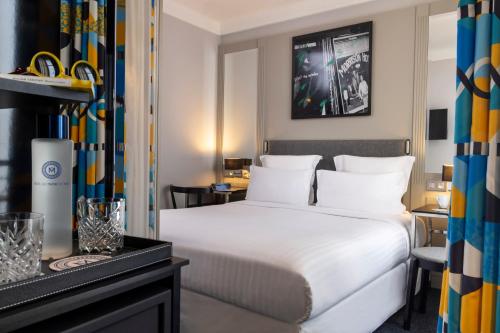 Habitación Clásica del hotel Les Matins De Paris and Spa. Foto 3