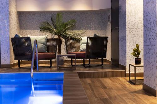Habitación Clásica con acceso al spa del hotel Les Matins De Paris and Spa. Foto 7