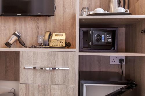 Habitación Triple del hotel Shepherds Bush London. Foto 1