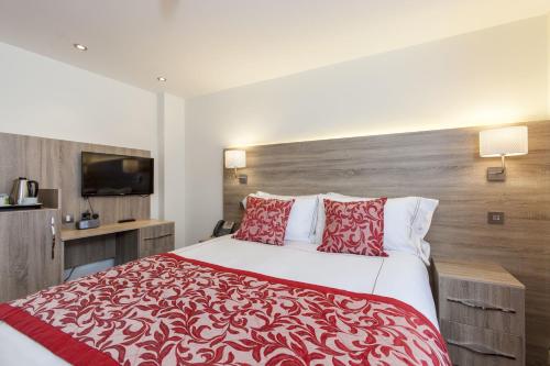 Habitación con cama extragrande. del hotel Shepherds Bush London. Foto 16