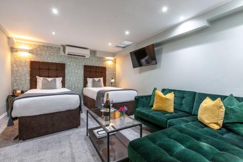 Habitación Cuádruple con ducha del hotel Shepherds Bush London. Foto 11