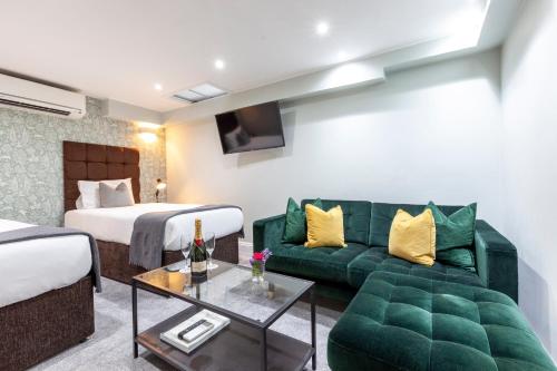 Habitación Cuádruple con ducha del hotel Shepherds Bush London. Foto 12