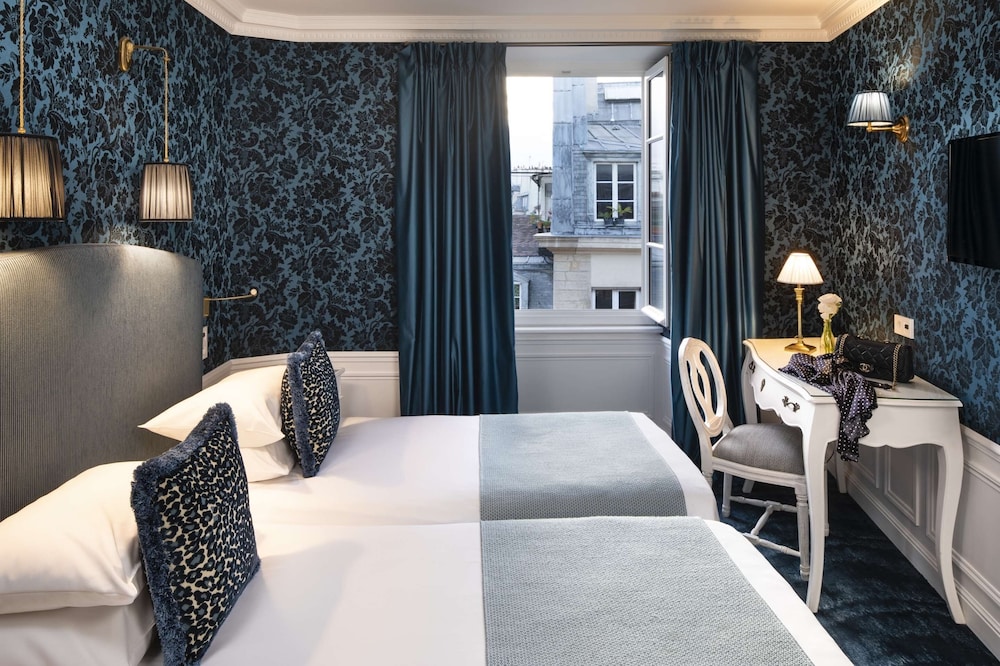 Habitación familiar, 2 habitaciones (Adjacent) del hotel Odéon By Malone. Foto 2