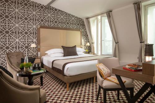 Habitación Executive con cama extragrande y acceso al spa del hotel Phileas Lazare and Spa - Opéra. Foto 3