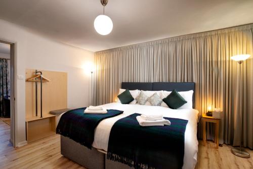 Habitación Deluxe con cama extragrande del hotel The Royal Foundation Of St Katharine. Foto 2