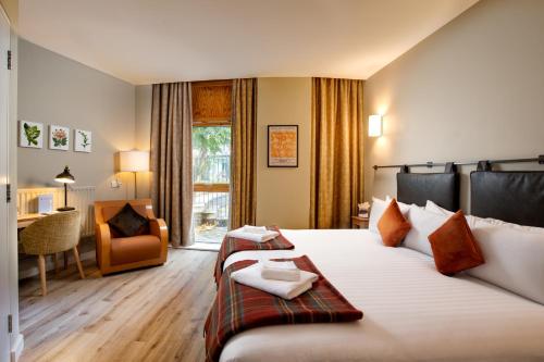 Habitación Deluxe con cama extragrande del hotel The Royal Foundation Of St Katharine. Foto 4