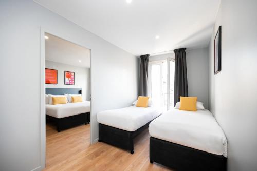 Apartamento 1 habitación Accesible 2 Camas individuales 1 Cama doble kitchenette del hotel Staycity s, Paris Gare De L'est
