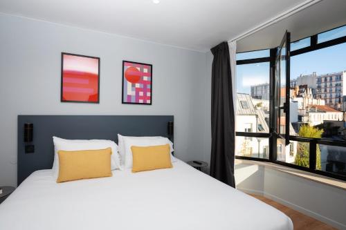 Apartamento 1 habitación Accesible 2 Camas individuales 1 Cama doble kitchenette del hotel Staycity s, Paris Gare De L'est. Foto 3
