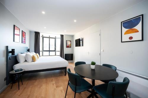 Apartamento 1 habitación Accesible 2 Camas individuales 1 Cama doble kitchenette del hotel Staycity s, Paris Gare De L'est. Foto 8