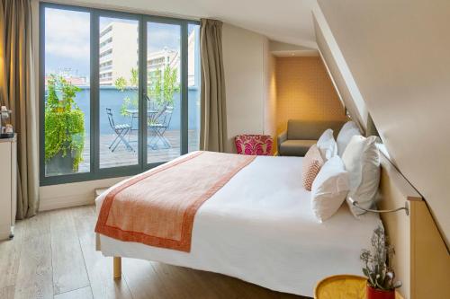 Suite Junior con terraza del hotel Vic Eiffel. Foto 1