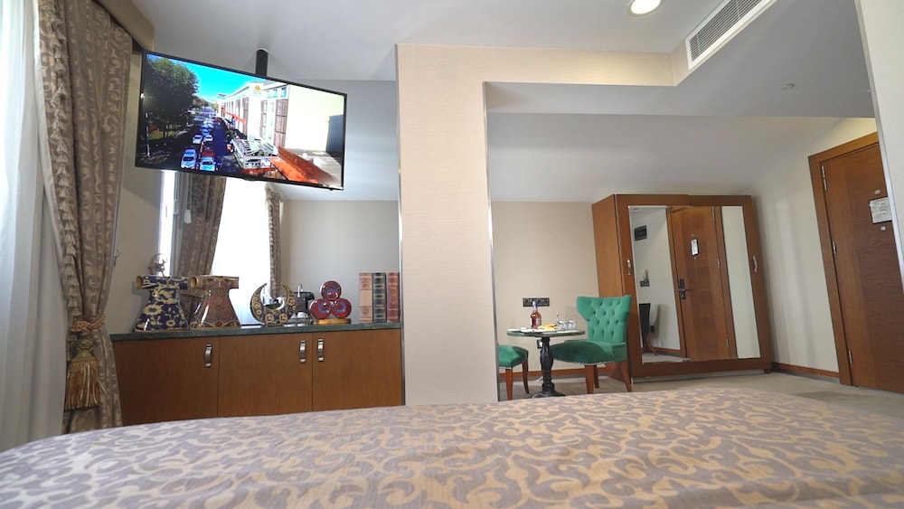 Habitación junior del hotel Dosso Dossi Hotels Old City. Foto 1