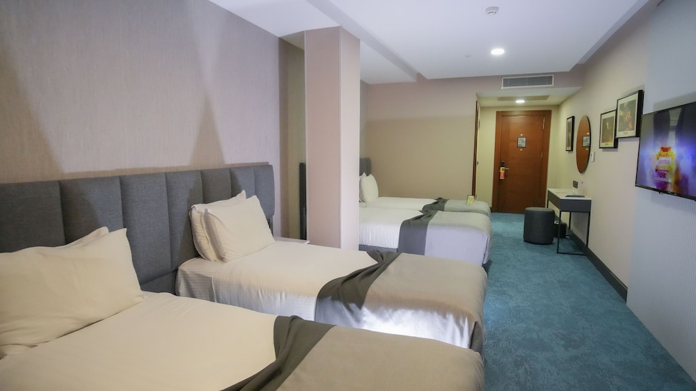 Habitación cuádruple estándar del hotel Dosso Dossi Hotels Old City