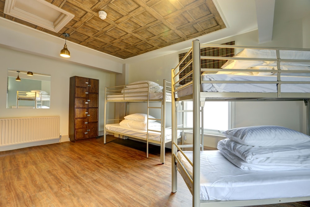 Cama en dormitorio compartido mixto de 8 camas del hotel Publove @ Exmouth Arms Euston. Foto 1