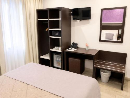 Habitación Doble Clásica - 1 o 2 camas del hotel Luxor Florence. Foto 9