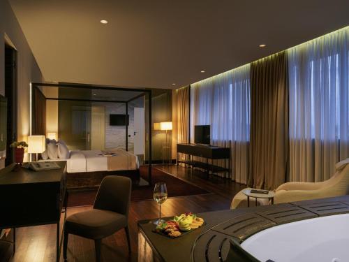 Suite Prestige con cama extragrande del hotel Berds Chisinau Mgallery Collection