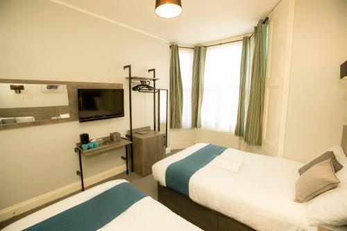 Habitación cuádruple del hotel Comfotel Blu