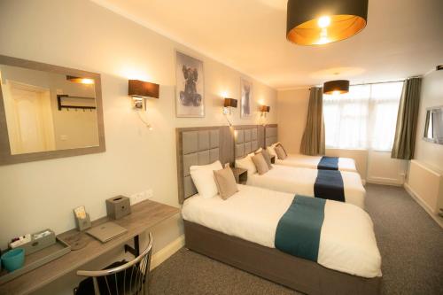 Habitación Familiar del hotel Comfotel Blu. Foto 2