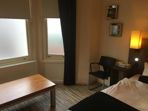 Suite Estudio de lujo del hotel Simply Rooms and Suites. Foto 2