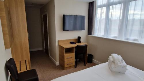 Habitación Estándar con cama extragrande - No fumadores del hotel Best Western Northfields Ealing. Foto 5