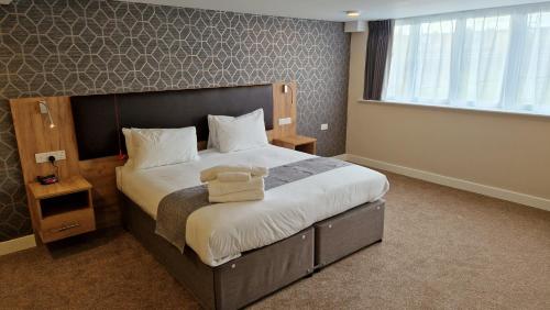 Habitación Superior con cama extragrande - Adaptada para personas de movilidad reducida del hotel Best Western Northfields Ealing. Foto 3