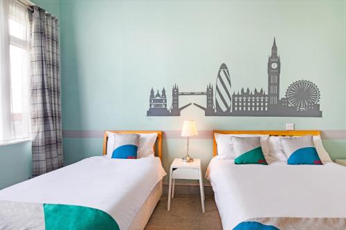 Habitación Triple Estándar del hotel The Green Man. Foto 1