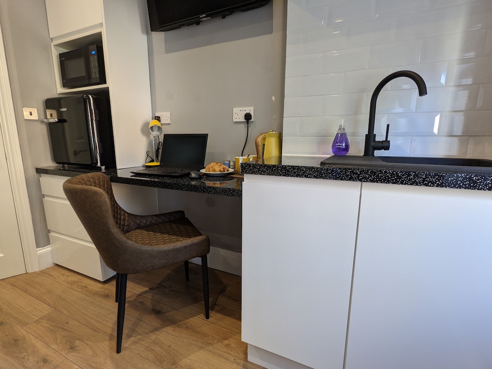 Estudio, baño privado (Studio Suite) del hotel Charlotte Guest House. Foto 2