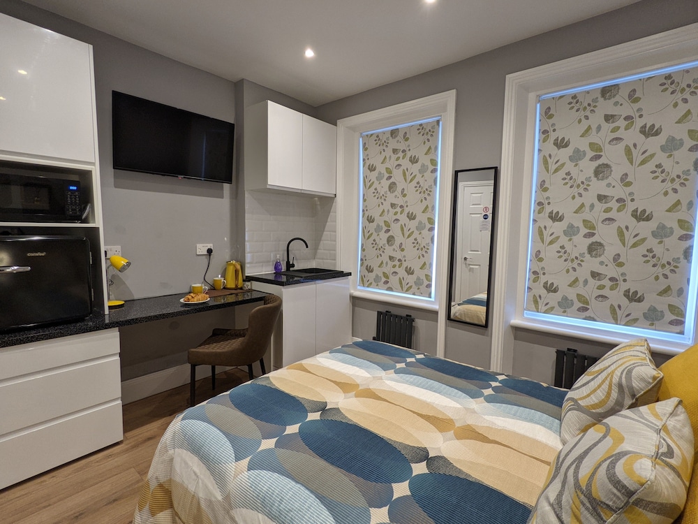 Estudio, baño privado (Studio Suite) del hotel Charlotte Guest House. Foto 3