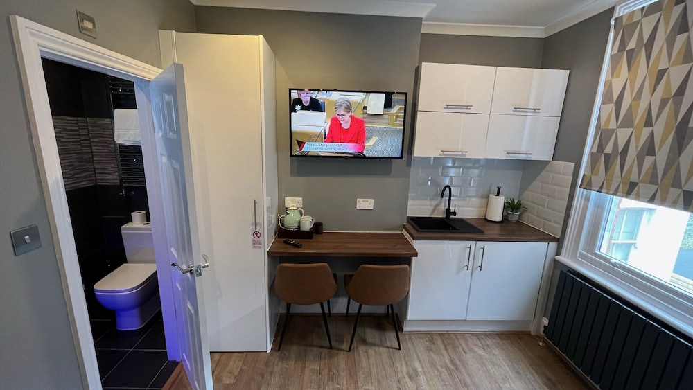 Estudio, baño privado (Studio Suite) del hotel Charlotte Guest House. Foto 9