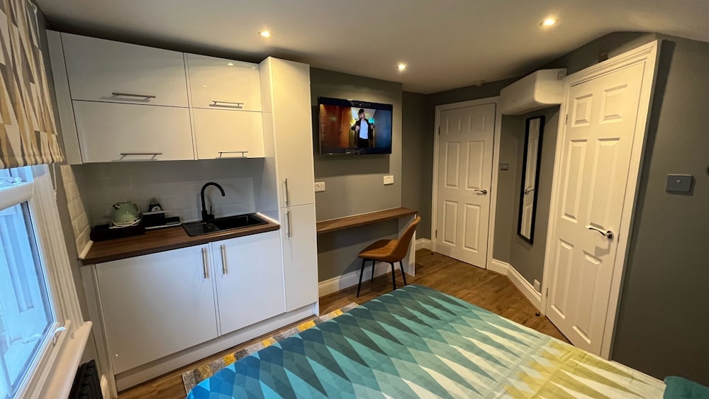 Estudio, baño privado (Studio Suite) del hotel Charlotte Guest House. Foto 14