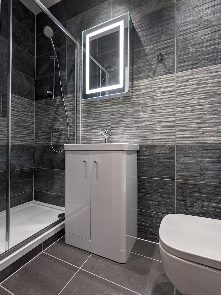 Estudio, baño privado (Studio Suite) del hotel Charlotte Guest House. Foto 16