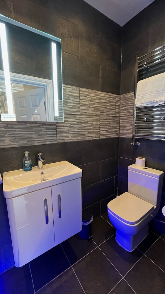 Estudio, baño privado (Studio Suite) del hotel Charlotte Guest House. Foto 18