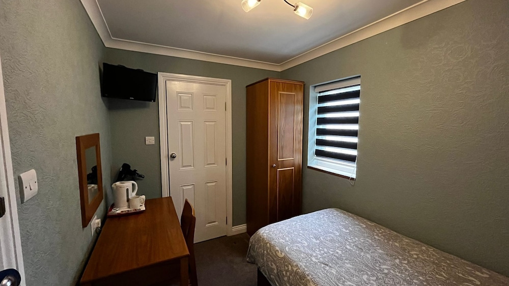 Habitación individual, baño privado (Mini) del hotel Charlotte Guest House. Foto 2