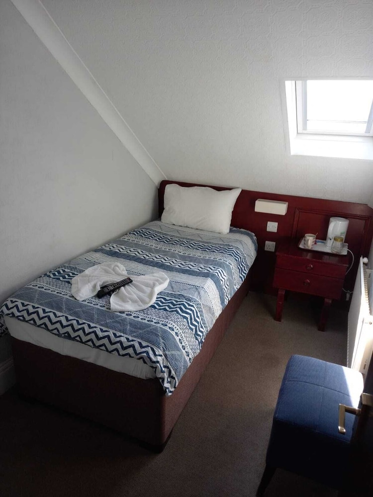 Habitación individual, baño compartido (Mini) del hotel Charlotte Guest House. Foto 2