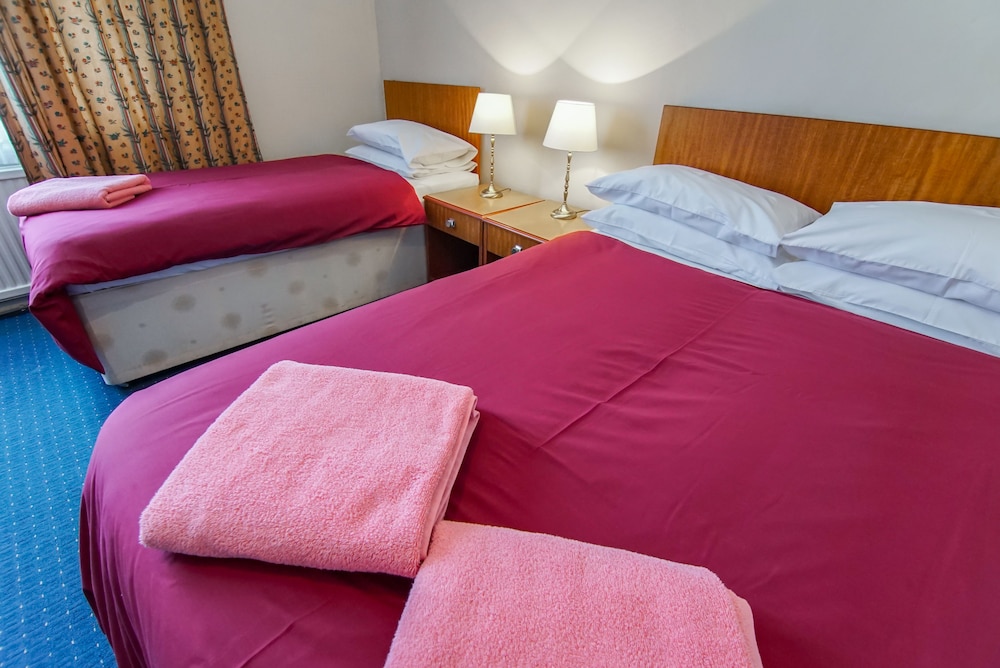 Habitación triple del hotel Avoca House. Foto 3