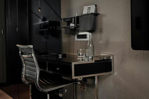 Habitación Anything But Standard con vistas a la ciudad - 1 cama grande del hotel Montcalm East, Autograph Collection. Foto 4