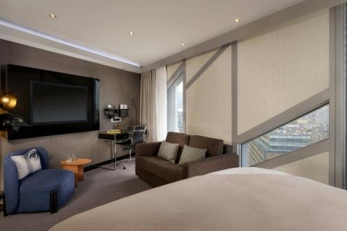 Habitación Junior Suite Dreams con sofá cama - 1 cama extragrande del hotel Montcalm East, Autograph Collection. Foto 3