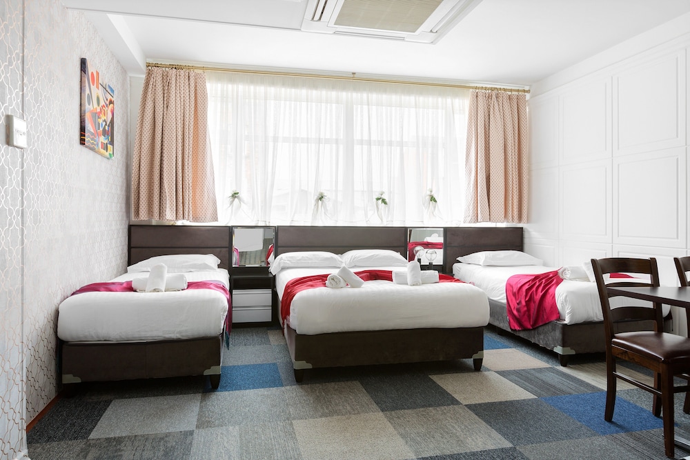 Habitación cuádruple, baño privado (Quatriple Studio) del hotel Central Hoxton Shoreditch