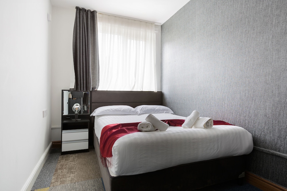 Habitación básica doble, baño privado del hotel Central Hoxton Shoreditch. Foto 3